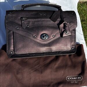 Coach Rhyder Messenger bag in Dark Metallic Plum Brown Copper